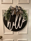 Black Circle, White Hello Door Hanger with Greenery and Bow